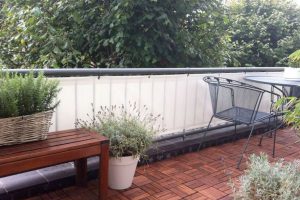 bevestigen balkondoek aan balkonhek