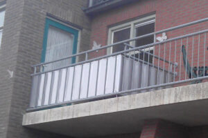 Hoe maak je je balkon minder winderig