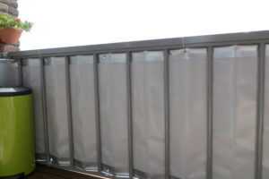 Wat te doen tegen in kijk op balkon