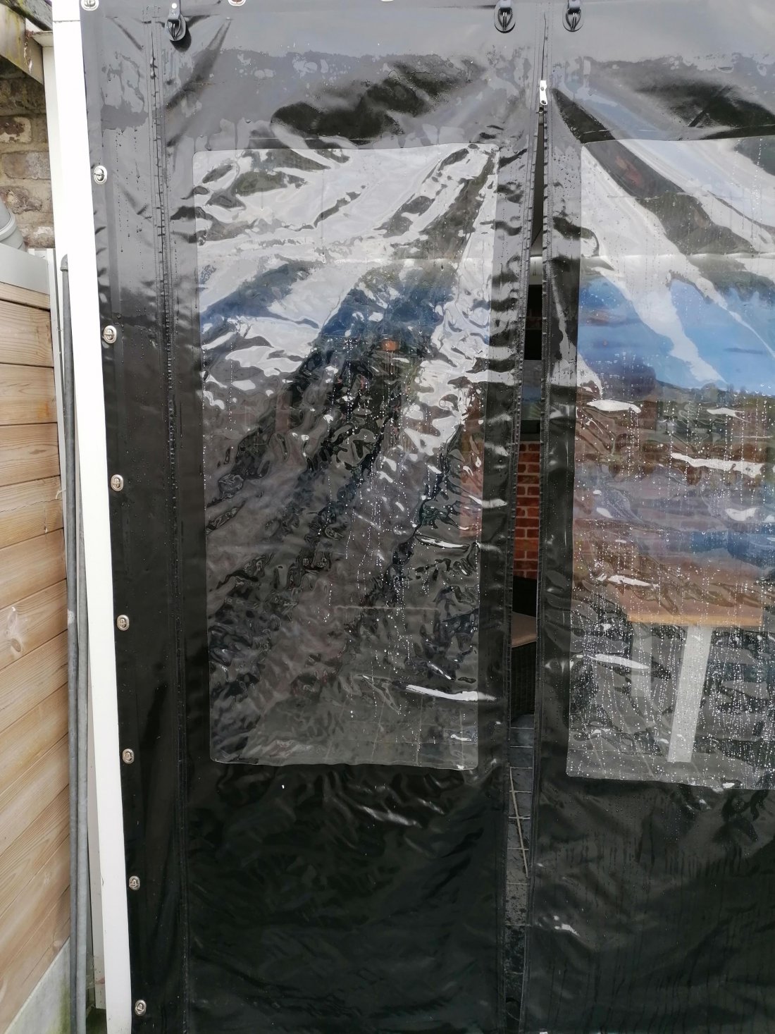 Overkapping met verandadoek in plaats van glas